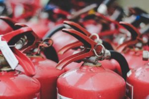 Top view of a large group of fire extinguishers