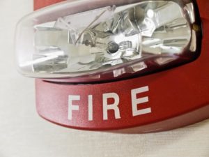 A red fire alarm light